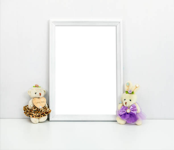 istock A4 A3 white wooden frame with toys on the table 1127478440