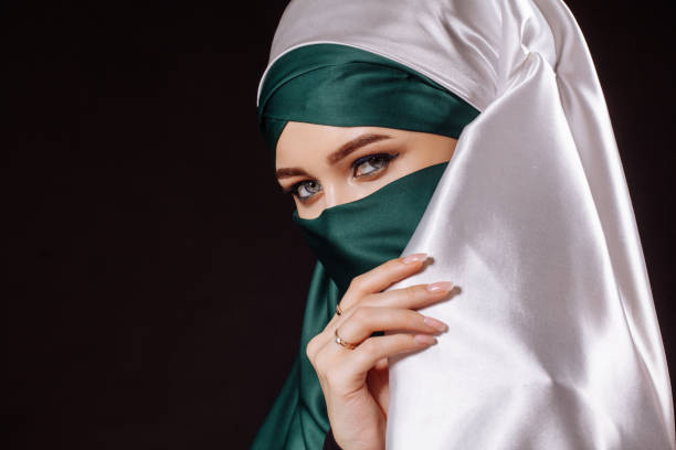 istock flirting Muslim young woman 1127481485