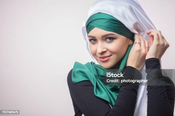 Close Up Portrait Od Beautiful Muslim Girl Showing How To Tie A 