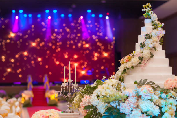 istock wedding cake  on flower near wedding candle. 1127481753