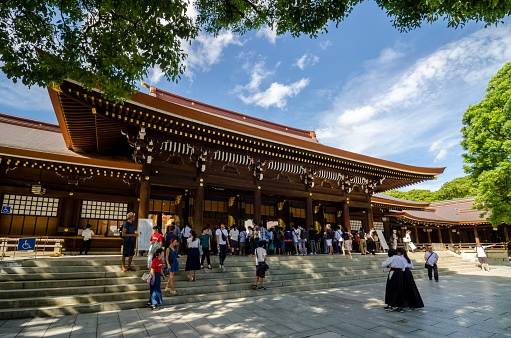 Meiji Shrine, Japan - 8th September, 2018. The Meiji Shrine can be found in the Shibuya district of Tokyo. It is a beautiful and serene haven in the hectic city and its grounds and surrounding park cover a large area. Tourists and locals visit the shrine every day of the year and can be seen in the photo.