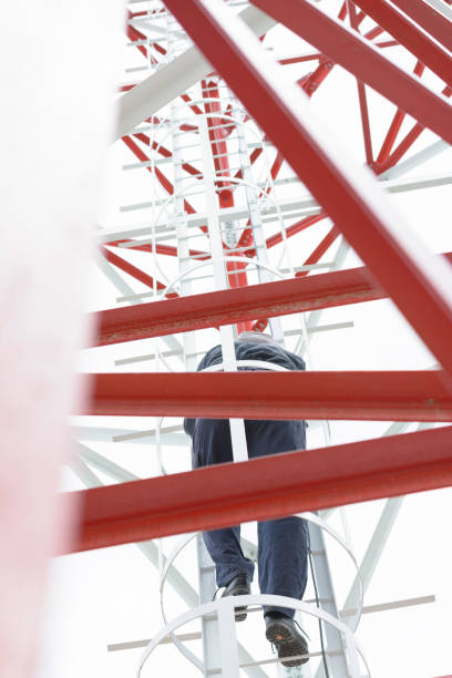 istock Lineworker is climbing a high power electric line tower 1127489258
