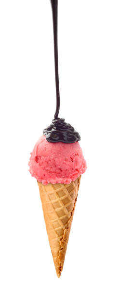 istock berry ice cream watered with chocolate 1127490511
