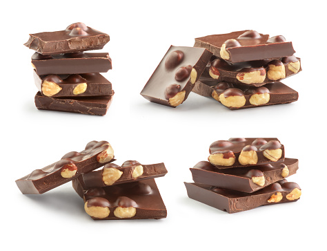 set of chocolate with nuts on a white background
