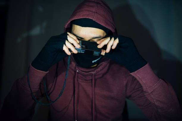 istock Man in Hoodie Picking up Information's 1127490698