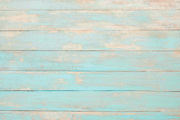 Vintage beach wood Vintage beach wood background - Old weathered wooden plank painted in turquoise blue pastel color. teal photos stock pictures, royalty-free photos & images