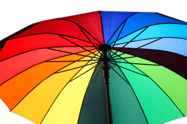 istock open umbrella with colorful wedges and black background 1127492531