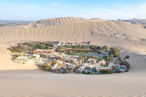 Dramatic afternoon just before the storm hits the desert town of Huacachina in Peru.