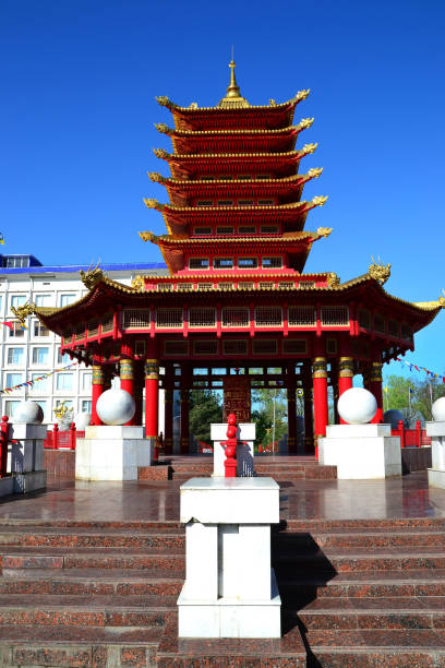 A view of the pagoda of Seven Days with a prayer drum and a mantra The central entrance to the prayer drum. pagoda of seven days Kalmykia Russia republic of kalmykia stock pictures, royalty-free photos & images