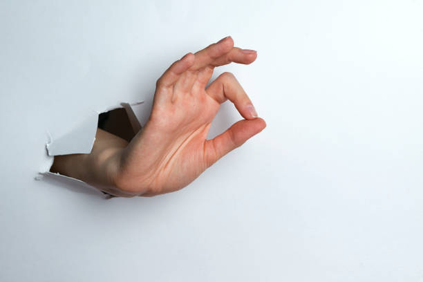 istock Woman's hand shows a circle with your fingers a white background. 1127495432