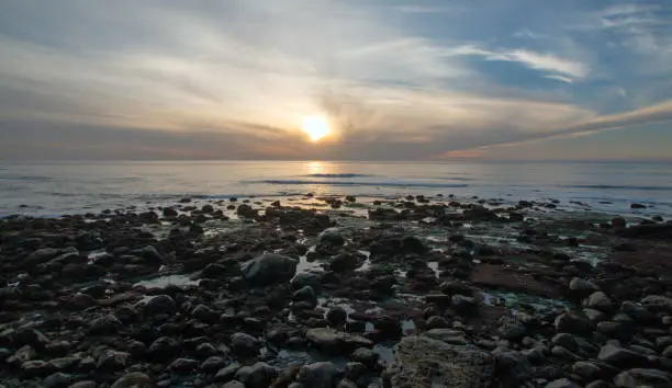 SUNSET OVER POINT LOMA TIDEPOOLS AT CABRILLO NATIONAL MONUMENT IN SAN DIEGO IN SOUTHERN CALIFORNIA UNITED STATES