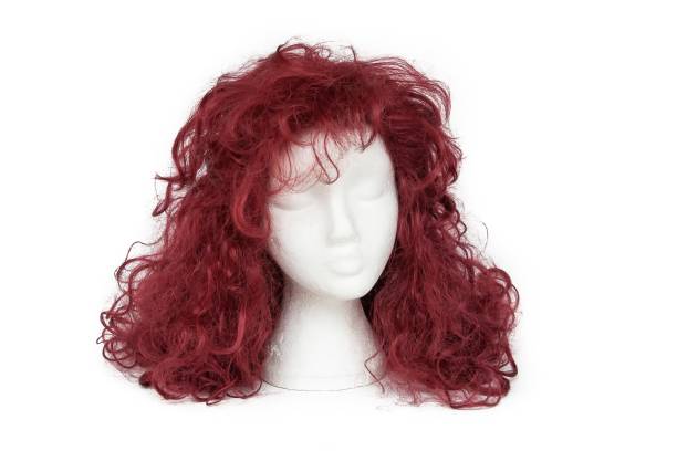 istock fashion color wig on white background. 1127498626