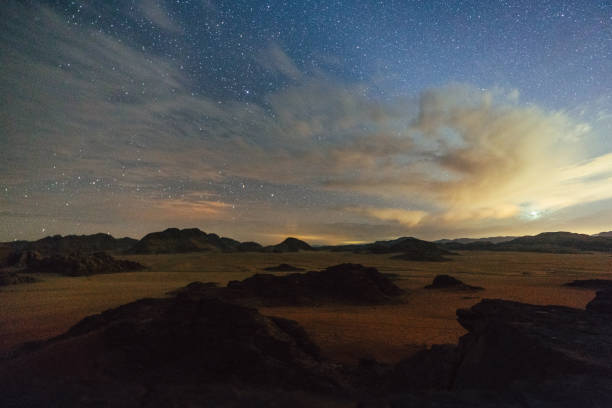 istock Scenic view of Wadi Rum desert at night 1127499034