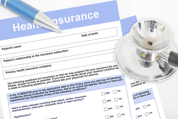istock Blank health insurance form with stethoscope 1127500687