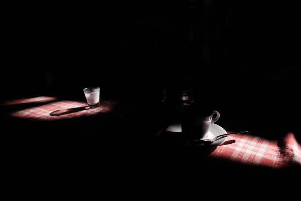 istock Hard light source on a cup of coffee and a glass of milk 1127501209