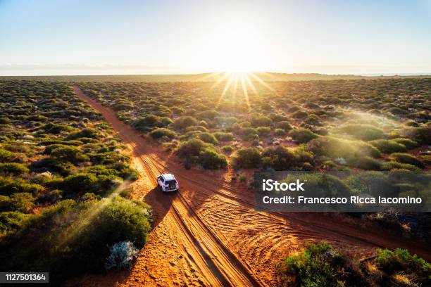 Driving Offroad In Western Australia At Sunset Stock Photo - Download Image Now - Australia, Outback, Travel