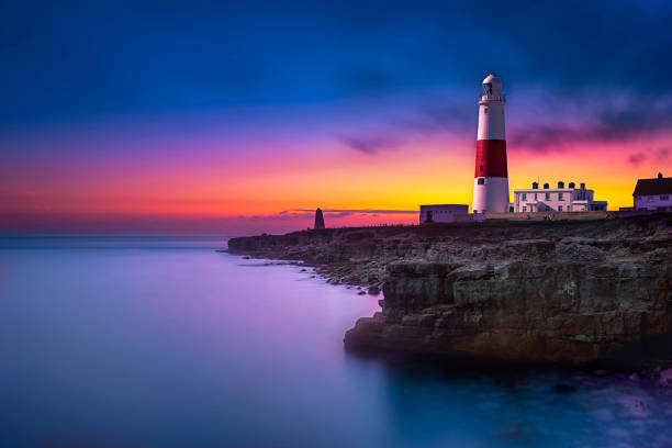 Portland Bill Lighthouse Dorset Portland Bill Lighthouse Sunset Dorset UK long exposure dorset england photos stock pictures, royalty-free photos & images
