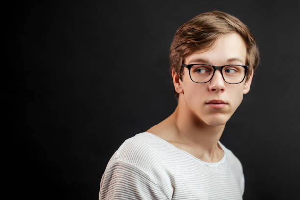 istock close up portrait of young handsome fair-haired guy avoiding danger 1127503336