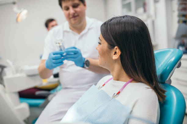 istock Young lady at the dentist 1127507595