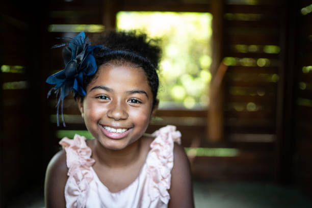 Afro latino child girl at playground wooden house Childhood afro latinx ethnicity stock pictures, royalty-free photos & images