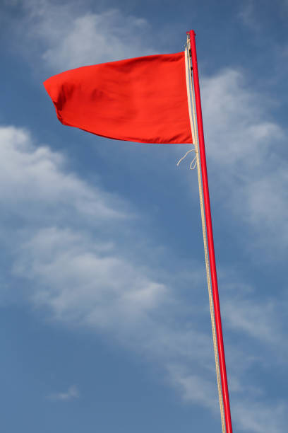 istock red flag to signal the danger 1127508056