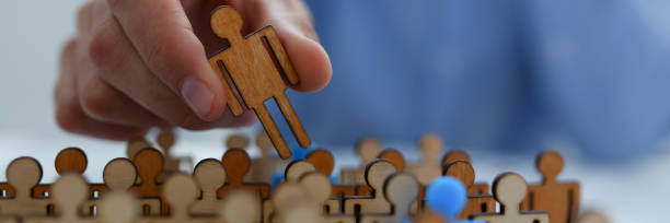 istock Businessman in blue shirt is holding a magnifying 1127508106