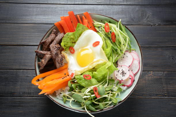 istock Bi Bim Bap rice - yukhoe-bibimbap 1127509206