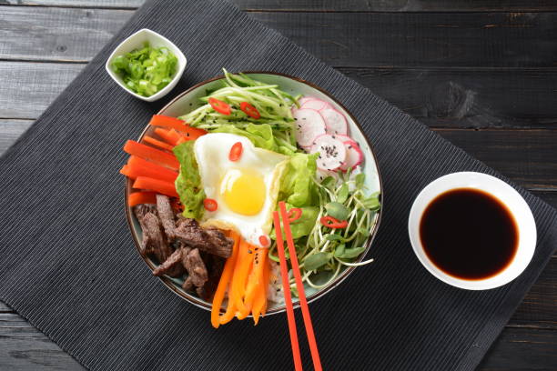 istock Bi Bim Bap rice - yukhoe-bibimbap 1127509358