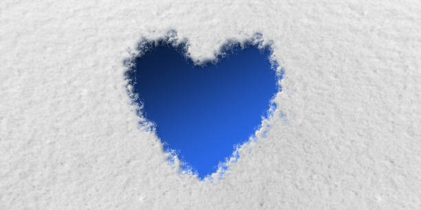 istock Blue Heart in front of Snow Background 1127510032