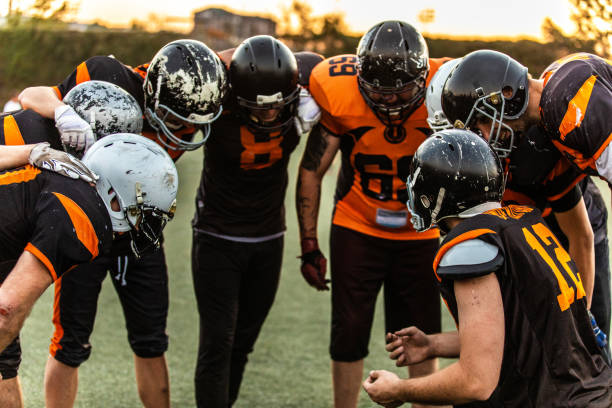 istock Football Team starting match 1127510859