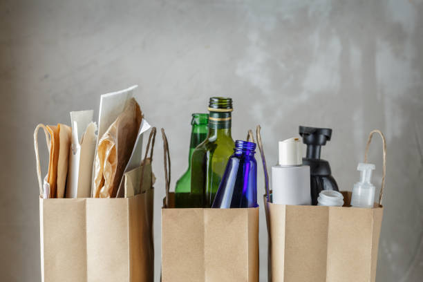 istock Three paper bags with sorted household waste 1127511294