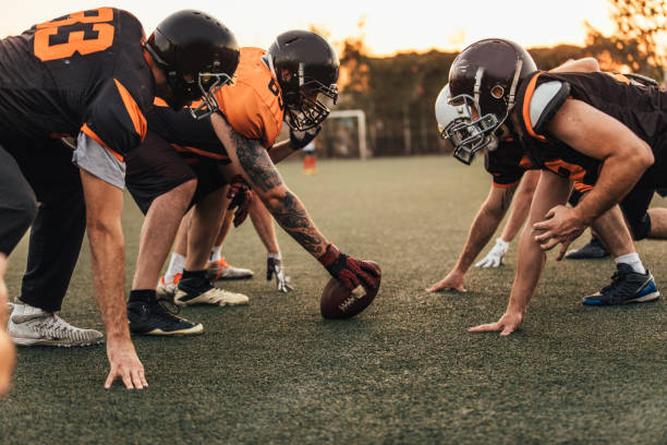 istock Football match in motion 1127511486