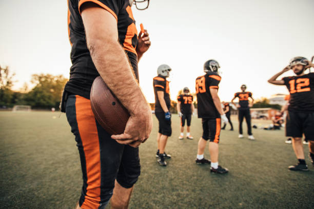istock Group of Football players on training 1127511615