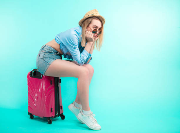 istock upset young woman has missed the train. 1127513158