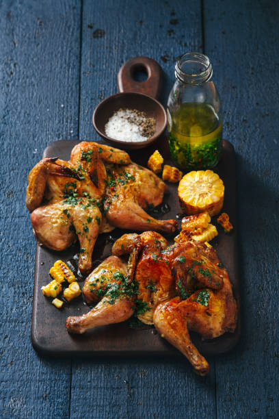 istock Grilled whole butterflied chickens 1127513841