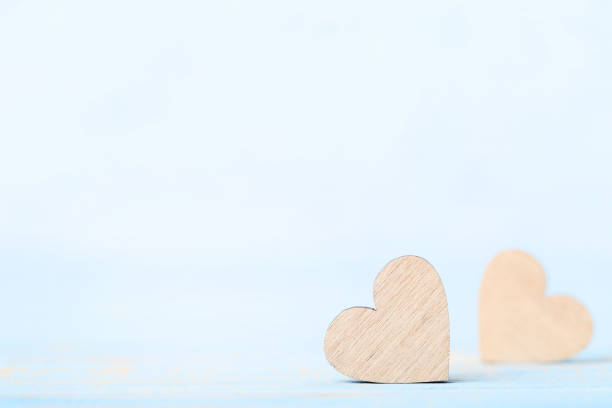 istock Brown wooden heart on the table 1127515727