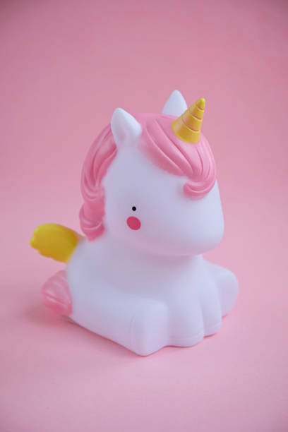 istock Unicorn light home decor on pink background 1127515953