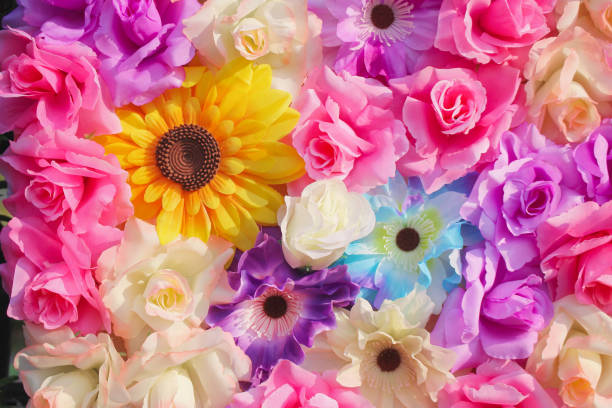 istock Group of ornamental colorful beautiful artificial muticolored flowers patterns abstract texture for background 1127517651