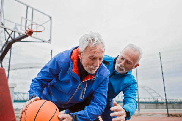 istock Seniors playing basketball 1127517702