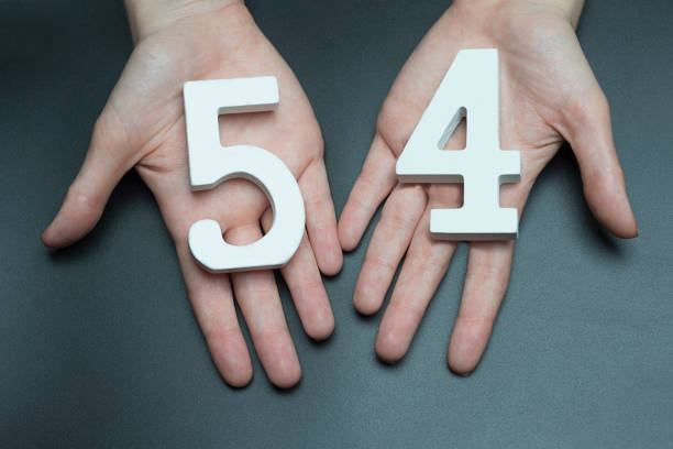 istock On the female palms figure fifty-four. 1127517996