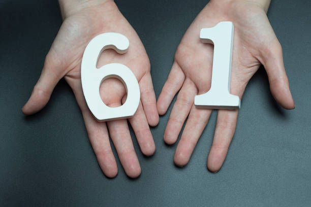 istock On the female palms figure sixty. 1127518080