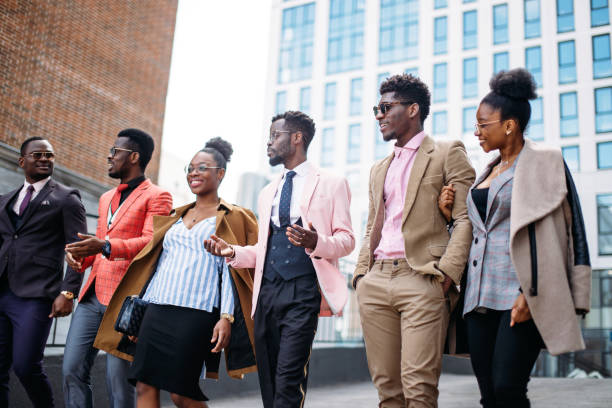 istock cheerful employees after turning the repot in 1127518836