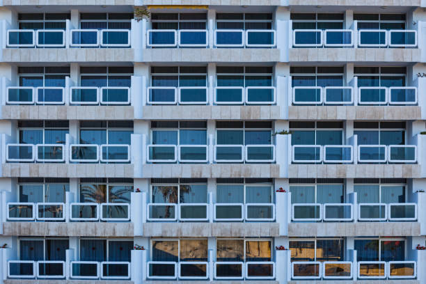 istock Facade with a lot of windows in the sun light 1127518844