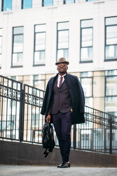 istock full length photo. attractive man dressed formally looking at the camera 1127518865