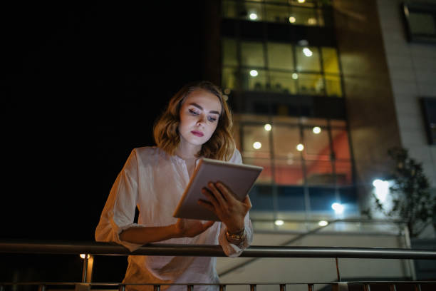 istock Portrait of a human resources manager working on her digital tablet outside her office 1127519216