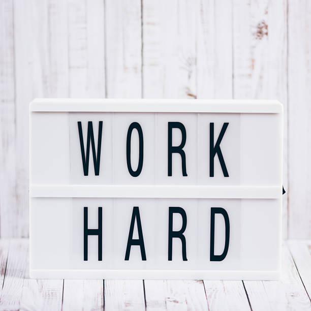 istock Lightbox with Powerful, Inspirational and Motivational Two Word Quote, Work Hard 1127520365