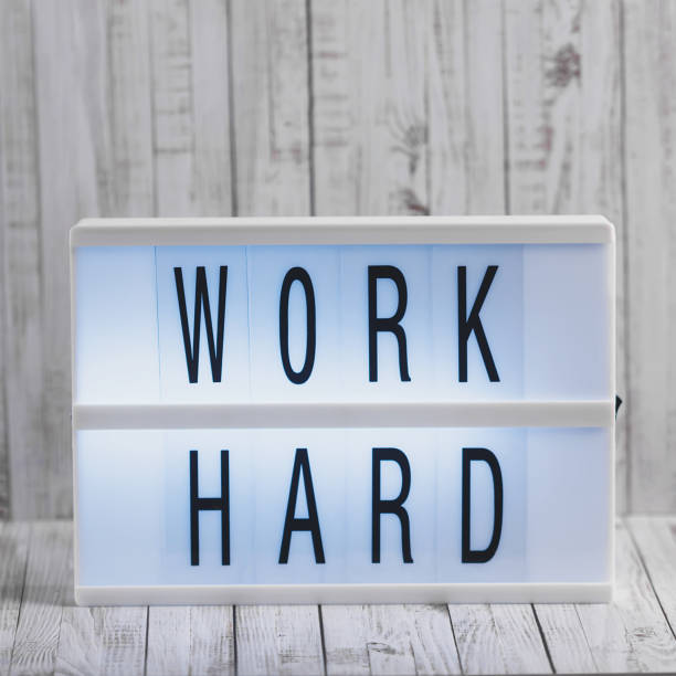 istock Lightbox with Powerful, Inspirational and Motivational Two Word Quote, Work Hard 1127520393