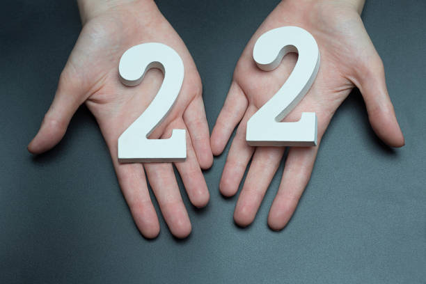 istock On the female palms figure twenty-two. 1127521087