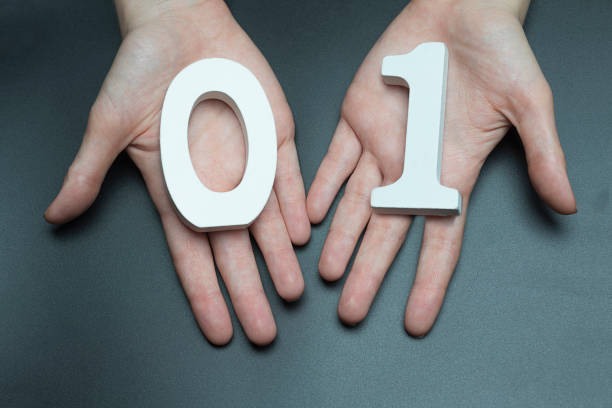 istock On the palms of the digit one and zero. 1127522717