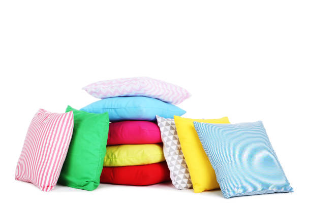 istock Soft colorful pillows isolated on white background 1127523185
